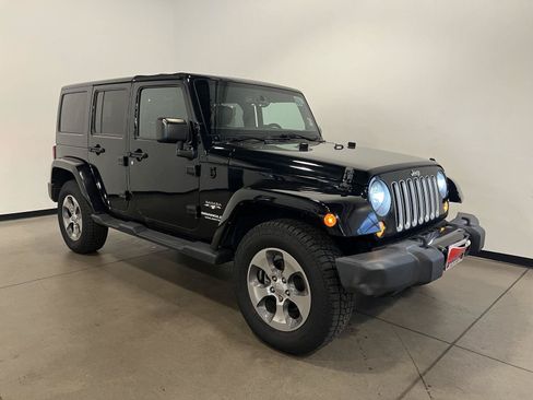 Used 2017 Jeep Wrangler Unlimited Sahara AWD/4WD image 1