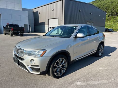 Used 2016 BMW X4 xDrive28i AWD/4WD image 1