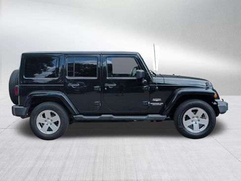 Used 2012 Jeep Wrangler Unlimited Sahara w/ Dual Top Group AWD/4WD image 8