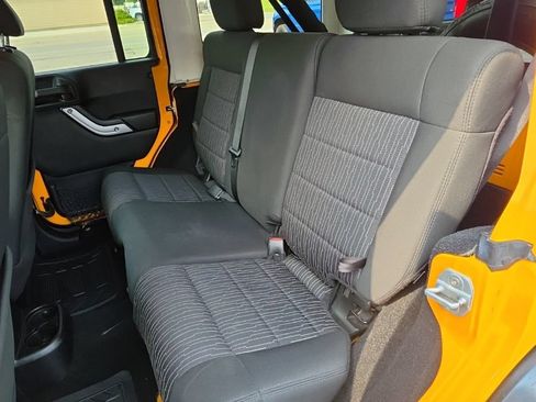 Used 2012 Jeep Wrangler Unlimited Sahara w/ Dual Top Group AWD/4WD image 19