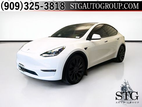 Used 2024 Tesla Model Y Performance AWD/4WD image 1