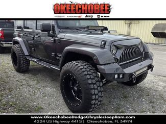 Used 2014 Jeep Wrangler Unlimited Sahara w/ Max Tow Package AWD/4WD video 1
