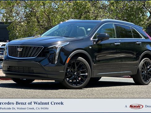Used 2023 Cadillac XT4 Luxury w/ Cold Weather Package AWD/4WD image 1