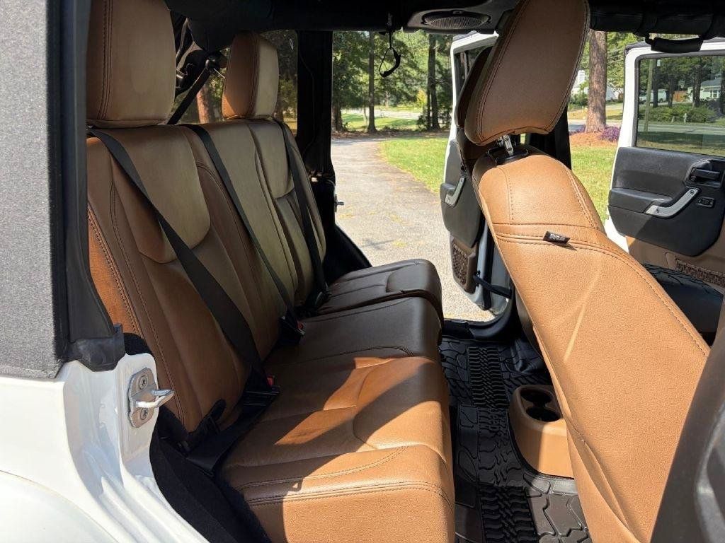 Used 2013 Jeep Wrangler Unlimited Sahara w/ Dual Top Group AWD/4WD image 39