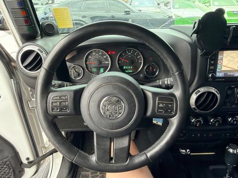Used 2014 Jeep Wrangler Unlimited Sahara w/ Mopar Chrome Edition Group AWD/4WD image 19