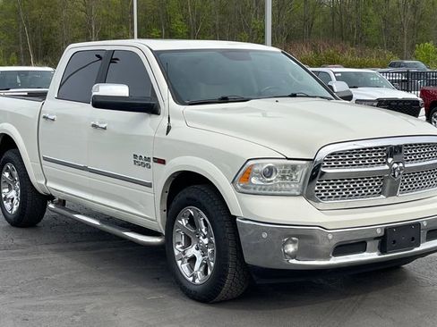 Used 2018 RAM 1500 Laramie AWD/4WD image 1