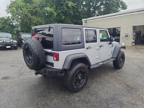 Used 2012 Jeep Wrangler Unlimited Sport w/ Dual Top Group AWD/4WD image 7