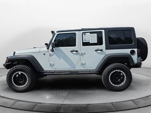 Used 2013 Jeep Wrangler Unlimited Sahara w/ Connectivity Group AWD/4WD image 2