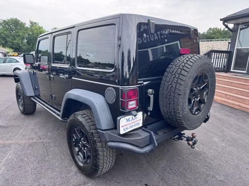 Used 2013 Jeep Wrangler Unlimited Sahara AWD/4WD image 4