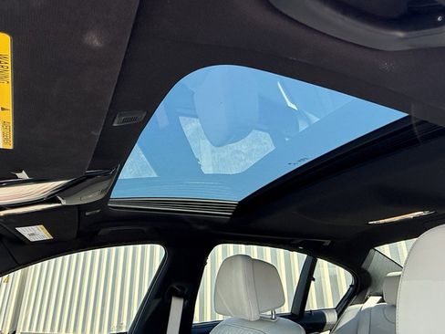 Used 2021 BMW M550i xDrive w/ Executive Package image 4