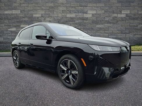 Used 2026 BMW iX xDrive60 w/ Premium Package AWD/4WD image 1