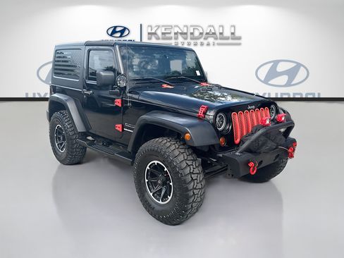 Used 2013 Jeep Wrangler Sport AWD/4WD image 1
