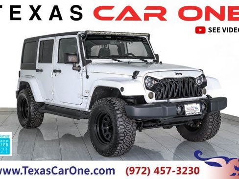 Used 2014 Jeep Wrangler Unlimited Sahara w/ Dual Top Group AWD/4WD image 1