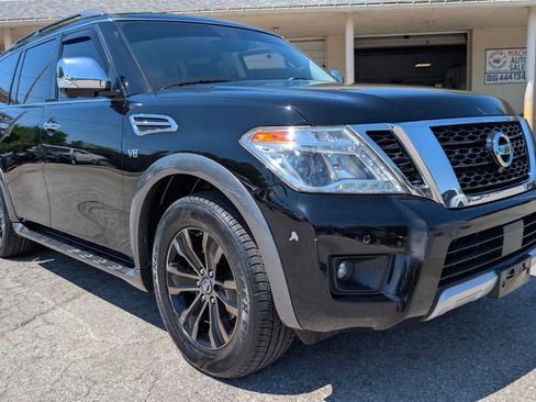 Used 2017 Nissan Armada Platinum w/ Captain Seat Package RWD image 1