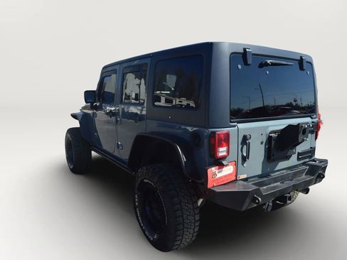 Used 2014 Jeep Wrangler Unlimited Rubicon w/ Dual Top Group AWD/4WD image 7
