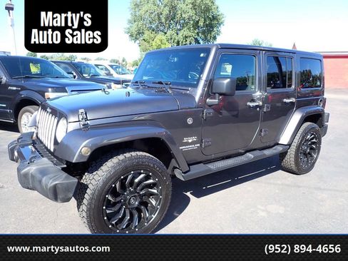 Used 2016 Jeep Wrangler Unlimited Sahara w/ Connectivity Group AWD/4WD image 1