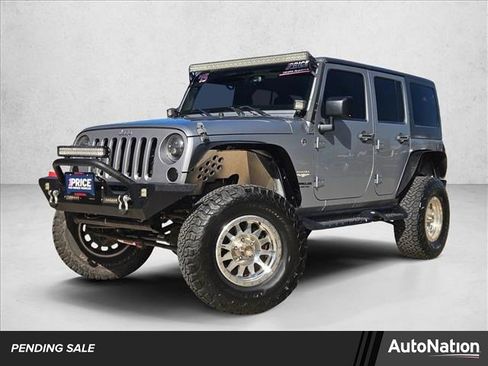 Used 2015 Jeep Wrangler Unlimited Sahara w/ Connectivity Group AWD/4WD image 1