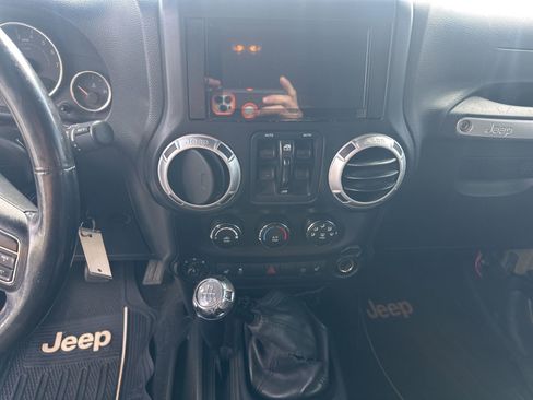 Used 2013 Jeep Wrangler Unlimited Rubicon w/ Dual Top Group image 11