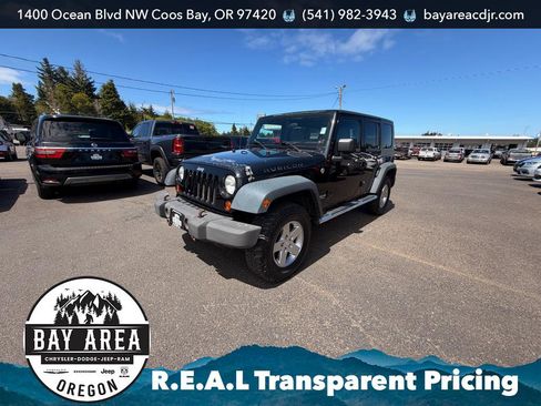 Used 2010 Jeep Wrangler Unlimited Rubicon w/ Dual Top Group AWD/4WD image 1