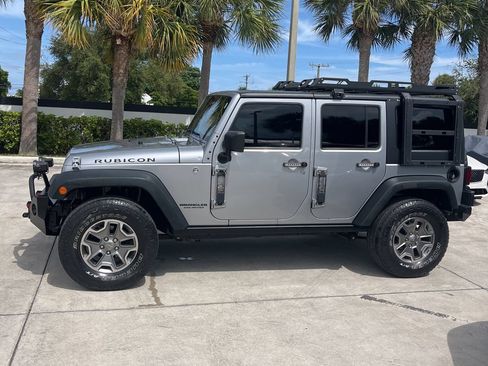 Used 2014 Jeep Wrangler Unlimited Rubicon w/ Connectivity Group AWD/4WD image 1