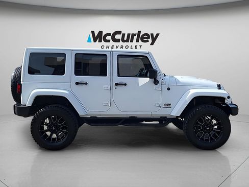 Used 2014 Jeep Wrangler Unlimited Sahara w/ Dual Top Group AWD/4WD image 8