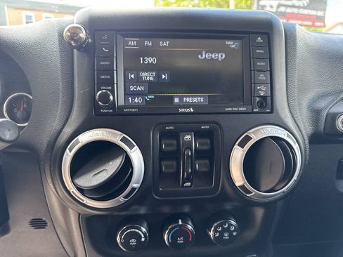 Used 2015 Jeep Wrangler Unlimited Sahara w/ Dual Top Group AWD/4WD image 12