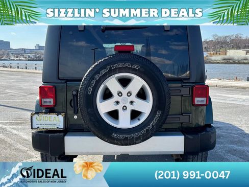 Used 2011 Jeep Wrangler Unlimited Sahara w/ Dual Top Group AWD/4WD image 5