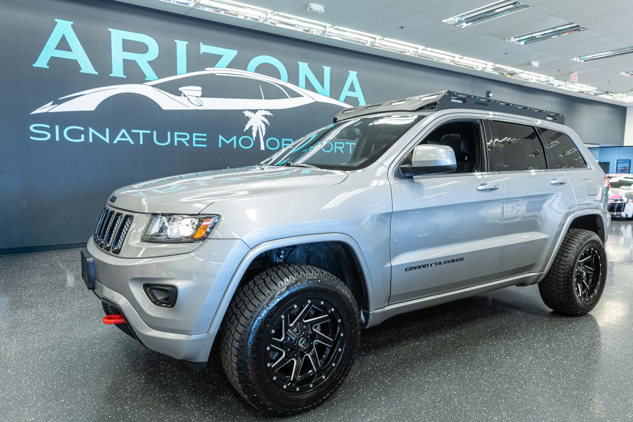 Used 2015 Jeep Grand Cherokee Altitude AWD/4WD image 1