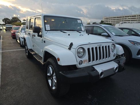 Used 2017 Jeep Wrangler Unlimited Sahara w/ Dual Top Group image 1