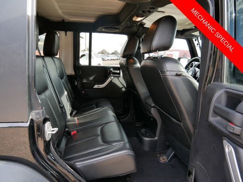 Used 2013 Jeep Wrangler Unlimited Rubicon w/ Dual Top Group AWD/4WD image 10