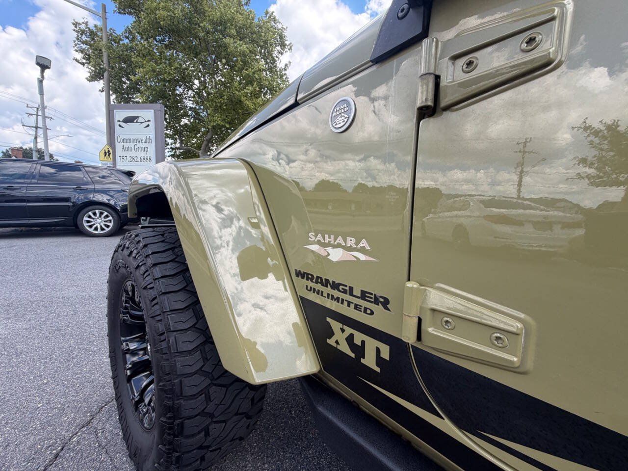 Used 2013 Jeep Wrangler Unlimited Sahara w/ Dual Top Group AWD/4WD image 35