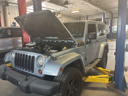 Used 2012 Jeep Wrangler Sahara AWD/4WD image 1