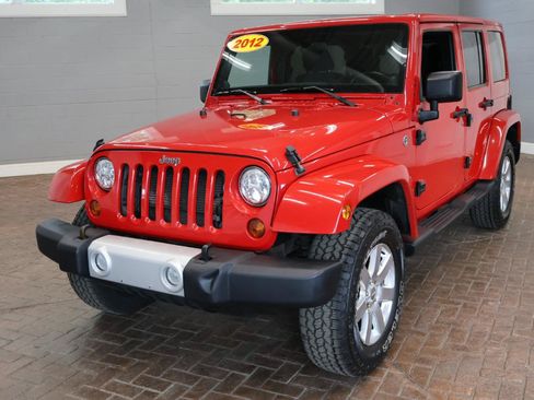 Used 2012 Jeep Wrangler Unlimited Sahara w/ Dual Top Group AWD/4WD image 3