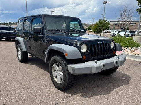 Used 2013 Jeep Wrangler Unlimited Sport AWD/4WD image 1