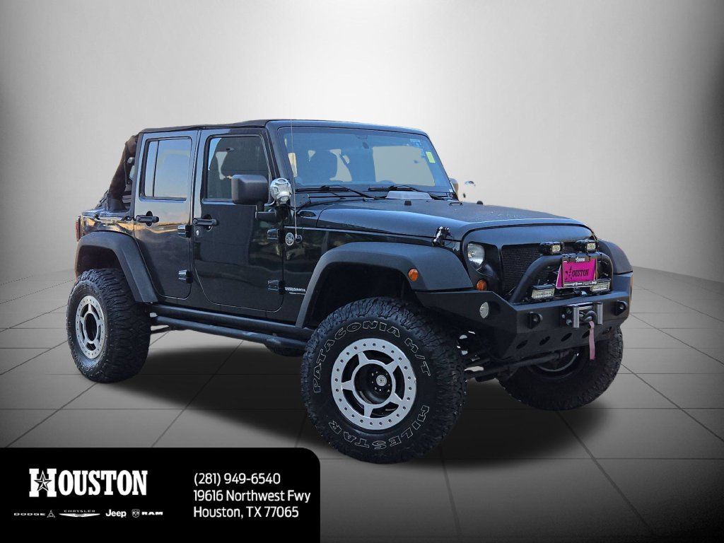 Used 2012 Jeep Wrangler Unlimited Rubicon w/ Max Tow Pkg AWD/4WD image 3