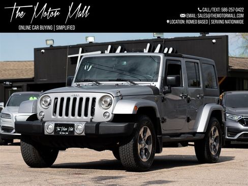 Used 2016 Jeep Wrangler Unlimited Sahara w/ Dual Top Group AWD/4WD image 1