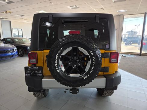 Used 2014 Jeep Wrangler Unlimited Sahara w/ Dual Top Group AWD/4WD image 6