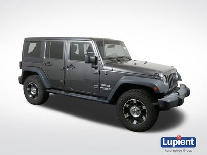 Used 2016 Jeep Wrangler Unlimited Sport w/ Mopar Black Appearance Group