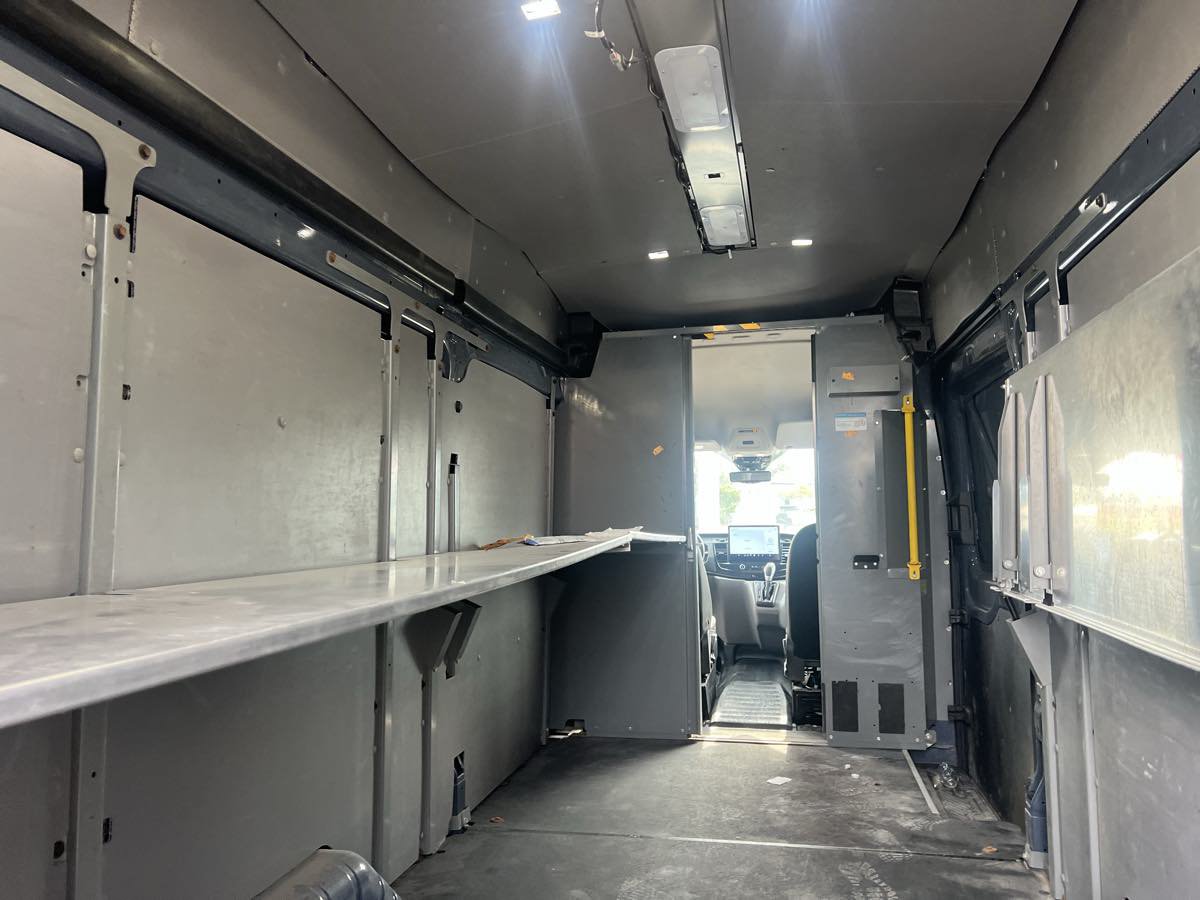 Used 2022 Ford Transit 250 148 High Roof Extended AWD w/ Parcel Delivery Package image 8