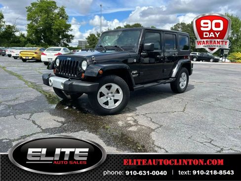 Used 2012 Jeep Wrangler Unlimited Sahara w/ Dual Top Group image 1