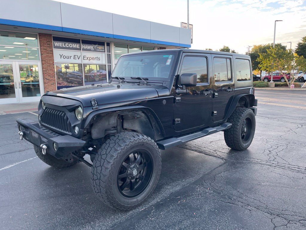 Used 2016 Jeep Wrangler Unlimited Sahara w/ Dual Top Group AWD/4WD image 1