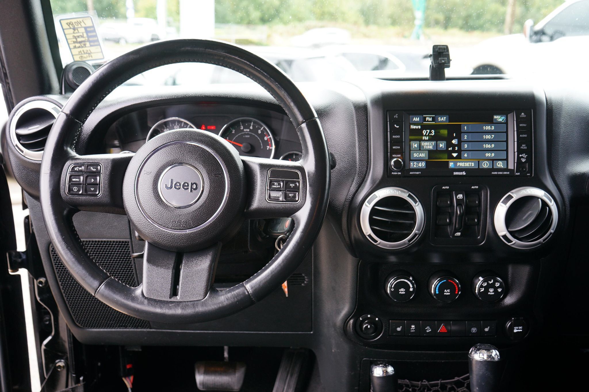 Used 2013 Jeep Wrangler Unlimited Sahara w/ Dual Top Group AWD/4WD image 16