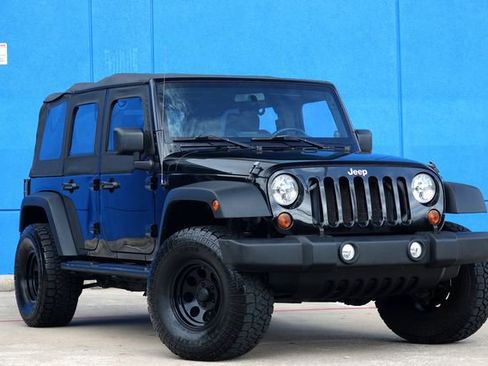 Used 2010 Jeep Wrangler Unlimited Sport image 1