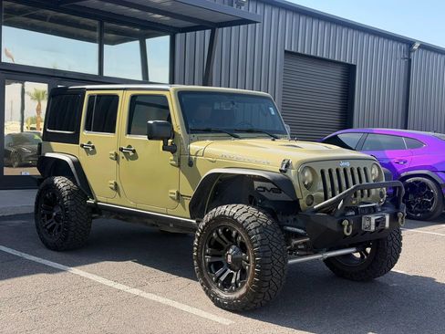 Used 2013 Jeep Wrangler Unlimited Rubicon w/ Dual Top Group AWD/4WD image 13