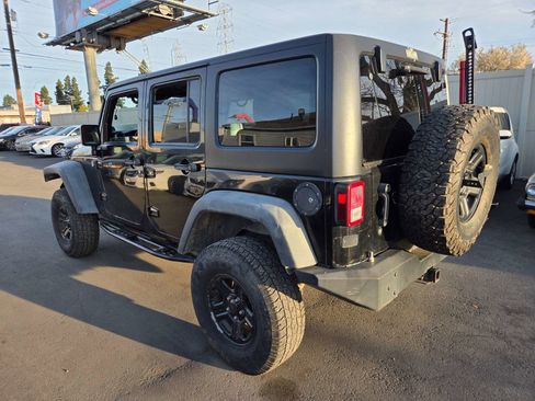 Used 2012 Jeep Wrangler Unlimited Sport image 2
