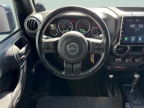 Used 2012 Jeep Wrangler Unlimited Sport w/ Black Appearance Group AWD/4WD image 24