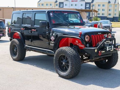 Used 2014 Jeep Wrangler Unlimited Sahara AWD/4WD image 1
