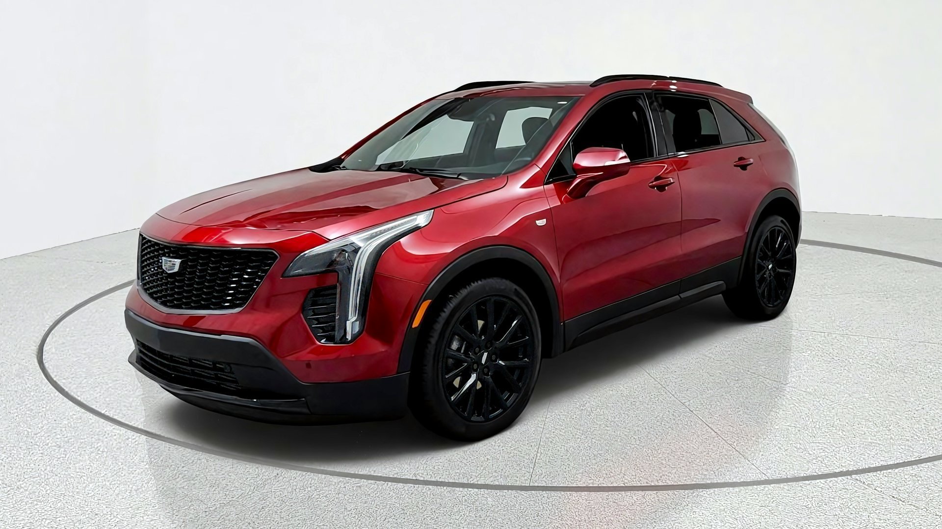 Certified 2022 Cadillac XT4 Sport w/ LPO, ONYX Package AWD/4WD image 1