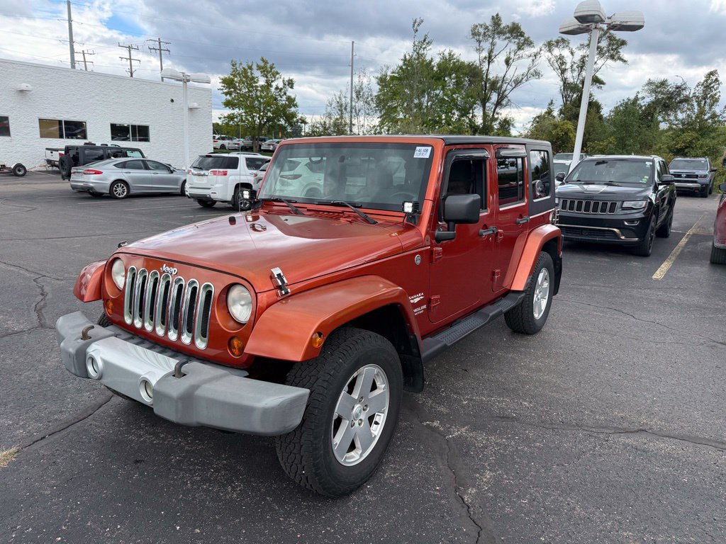 Used 2009 Jeep Wrangler Unlimited Sahara w/ Dual Top Group AWD/4WD image 10
