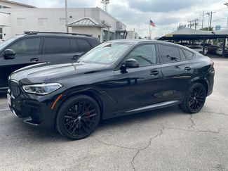 Used 2023 BMW X6 M50i w/ Executive Package AWD/4WD video 1